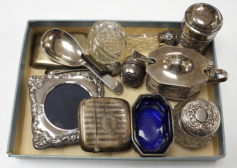 Sundry small silver etc., including condiments, toilet jars, vesta case, sterling envelope stamp case, plated match sleeve and silver caddy spoon. Condition - poor to fair